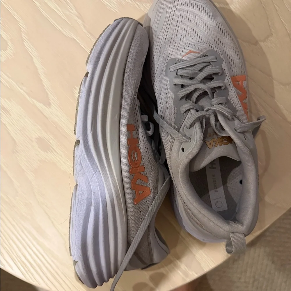 Hoka Women's Gray and Orange Running Shoes - Picture 2 of 4